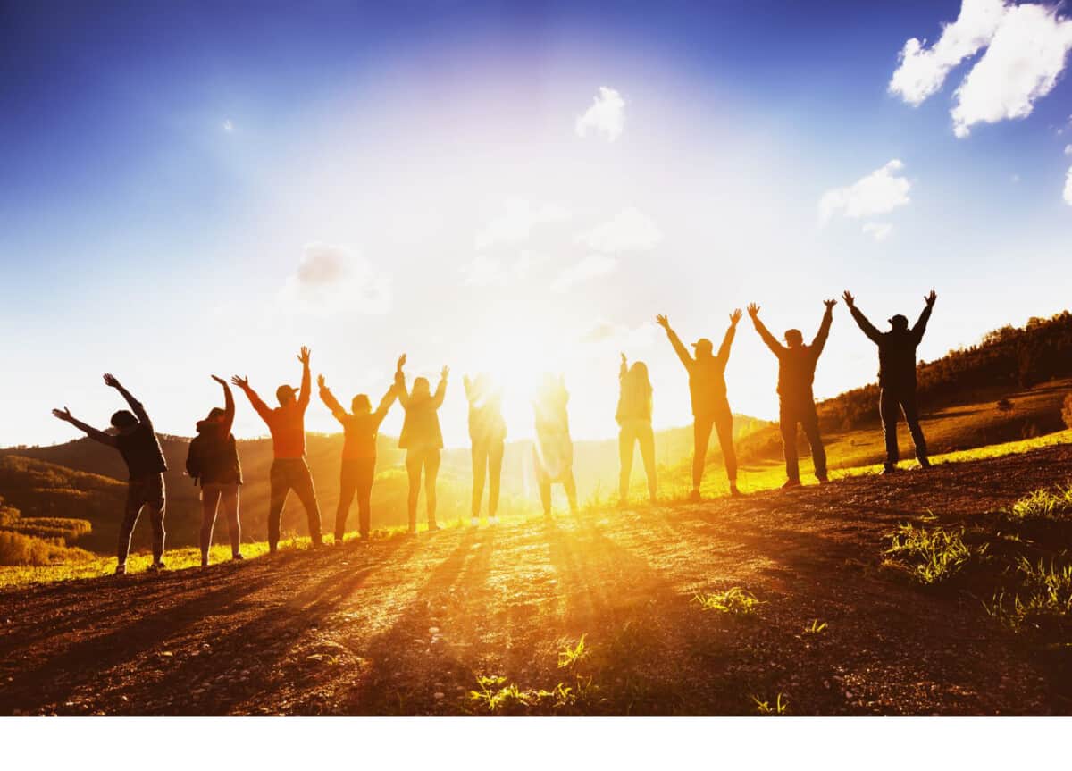 Young people greeting the sunrise