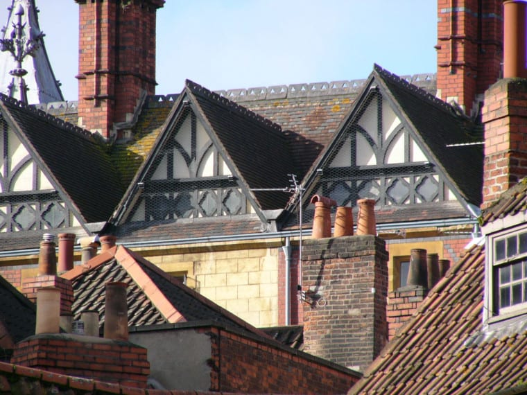 a close up of the roofs of terraced homes