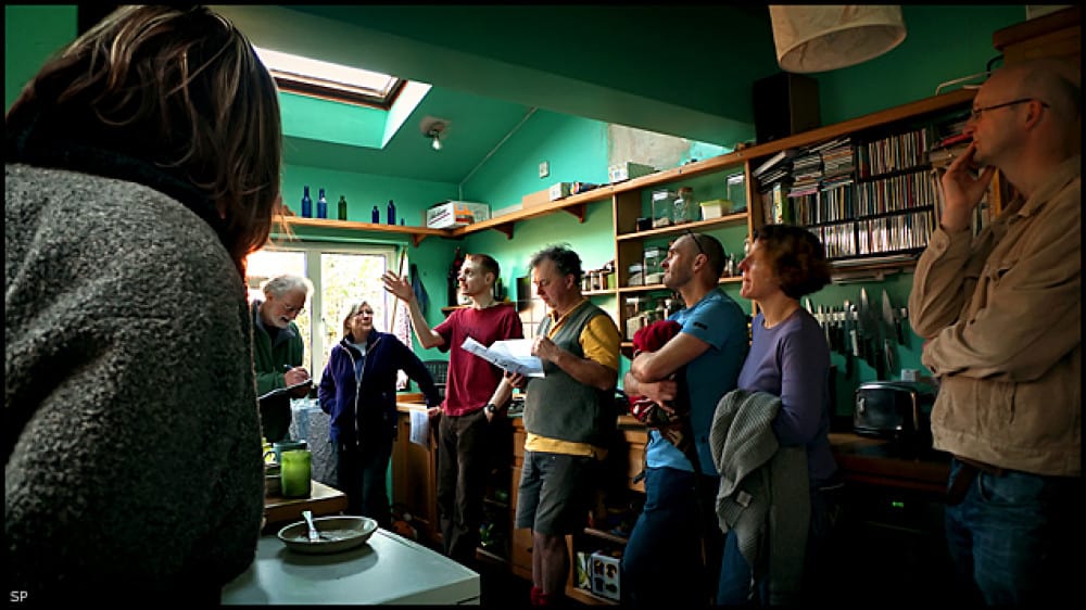 People gather inside house for an open doors event