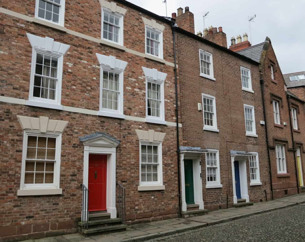 A street of old, 3-storey homes in a conservation area of Chester. 