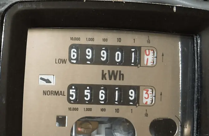 Close up of economy 7 meter showing two sets of dials for peak use and off peak use.