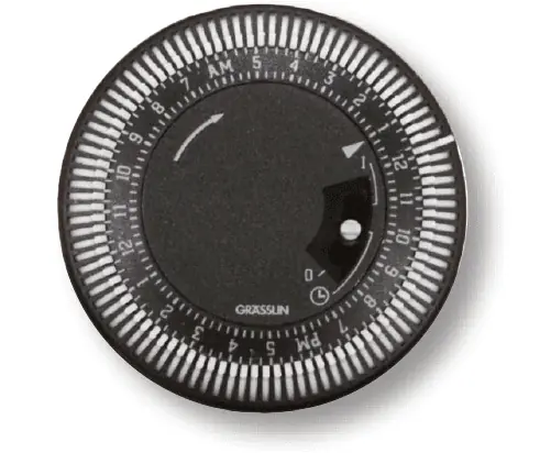 Hot water tank controls for use with economy 7 tariff