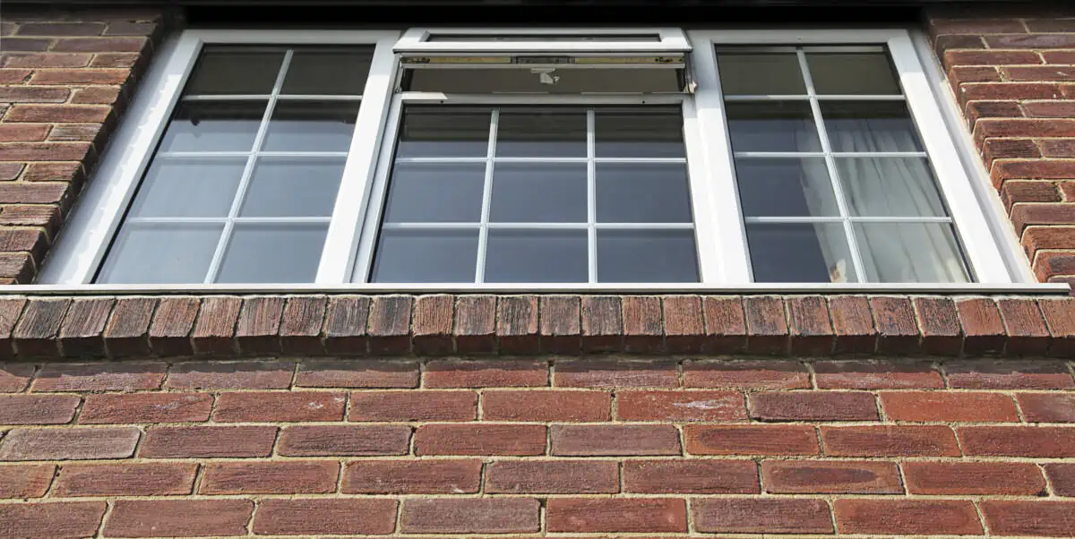 Modern double-glazed windows in a brick-built home.