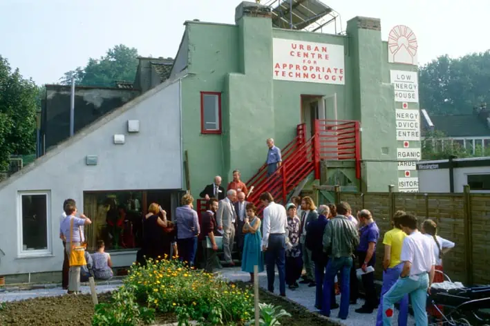 A small crowd mark the opening of the Urban Centre for Appropriate Technology in around 1981