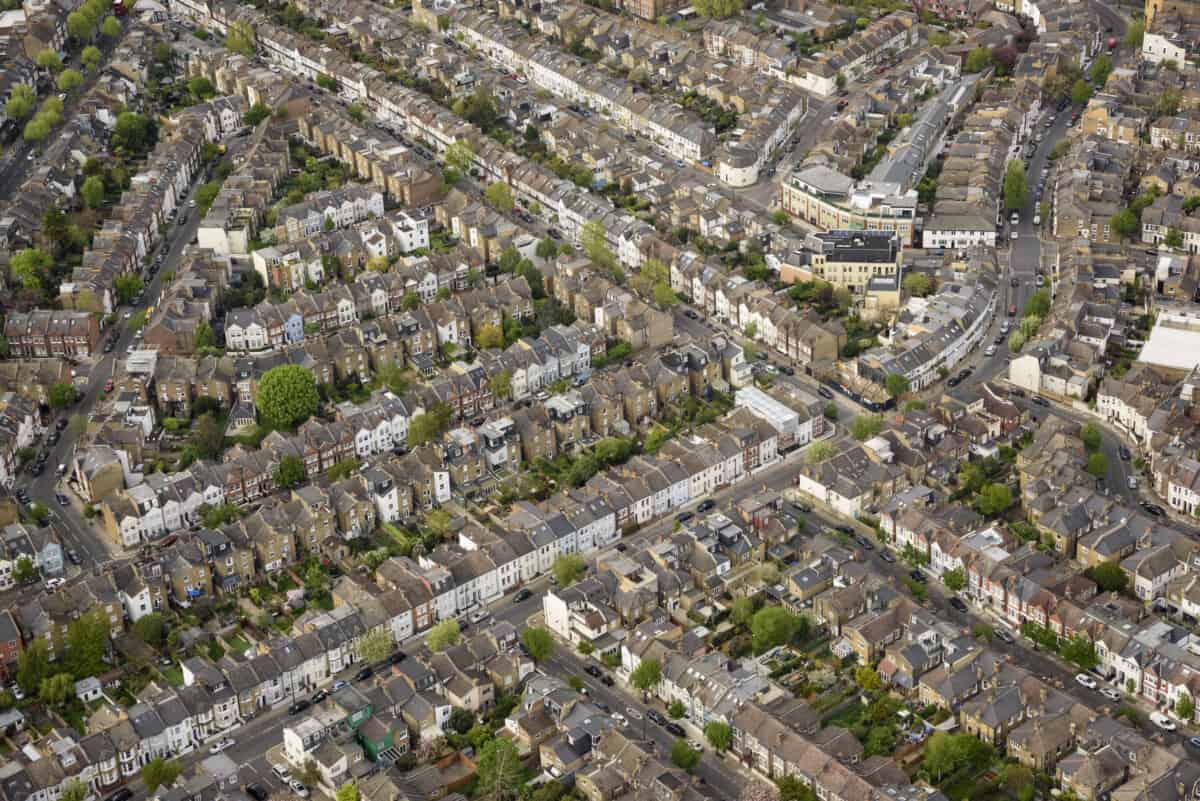 Aerial view over Fulham, London showing large expanse of Victorian and Edwardian terraced housing