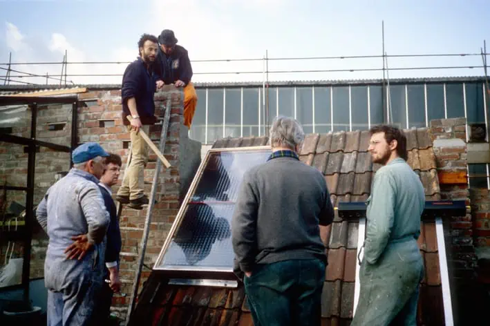 Putting up solar panels at the Future City Home.