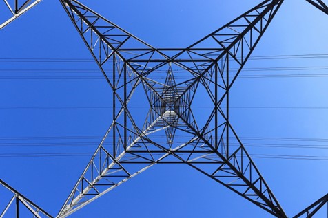 A photograph of a pylon taken from below