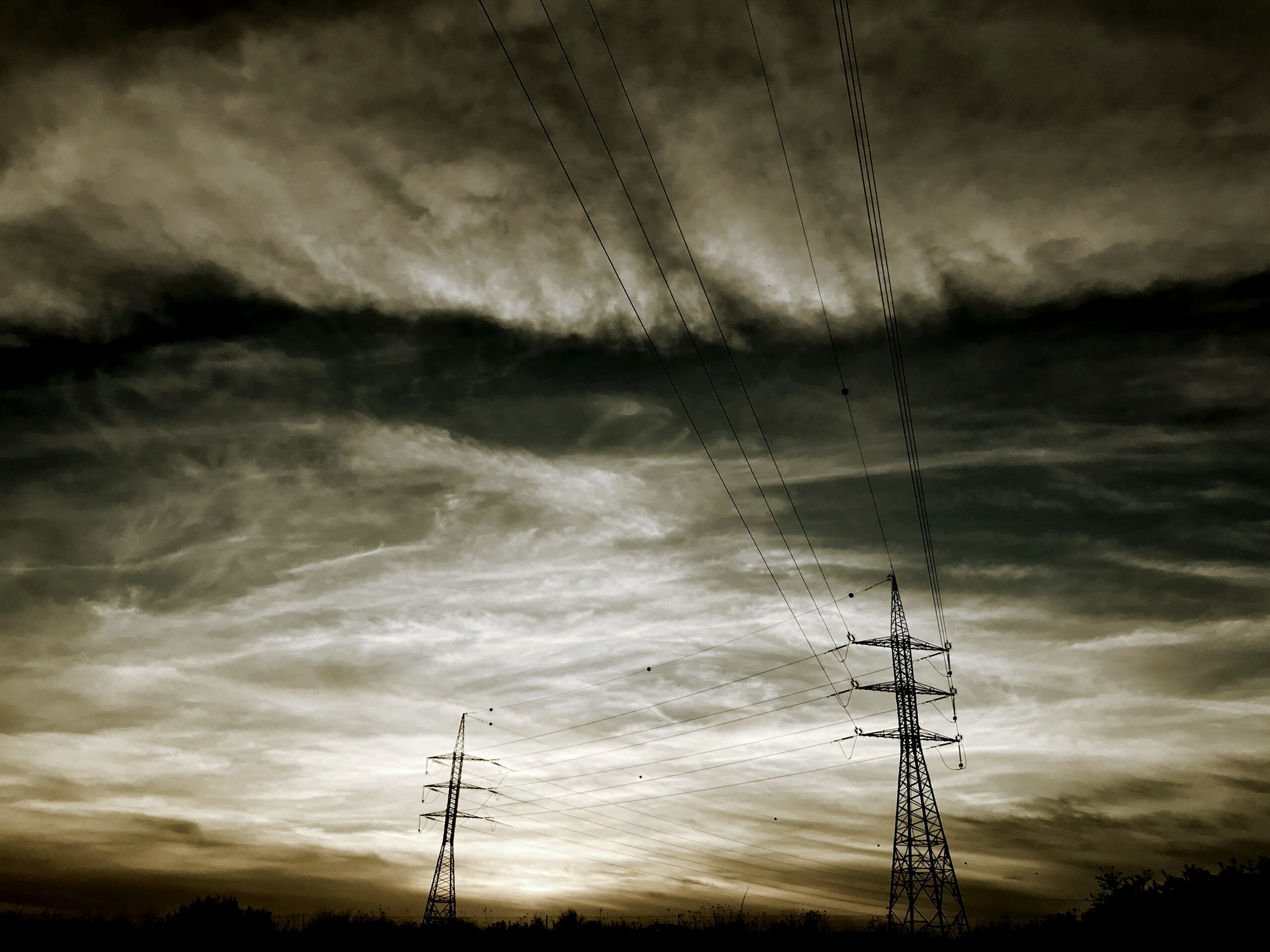 Power lines in stormy clouds