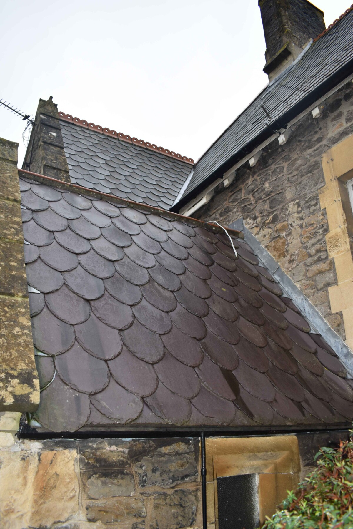 Large tiled roof of a grade 2 listed building.