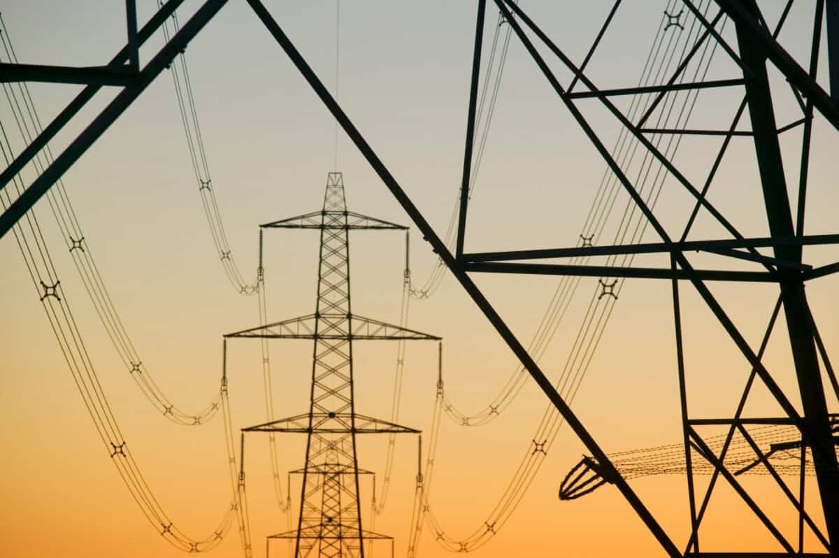 Pylons against an evening sky.