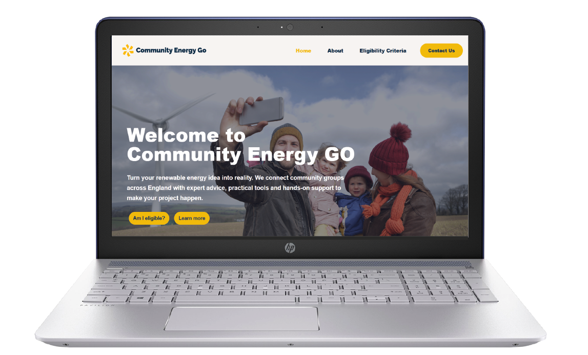 Laptop showing the home page of community energy go website.
