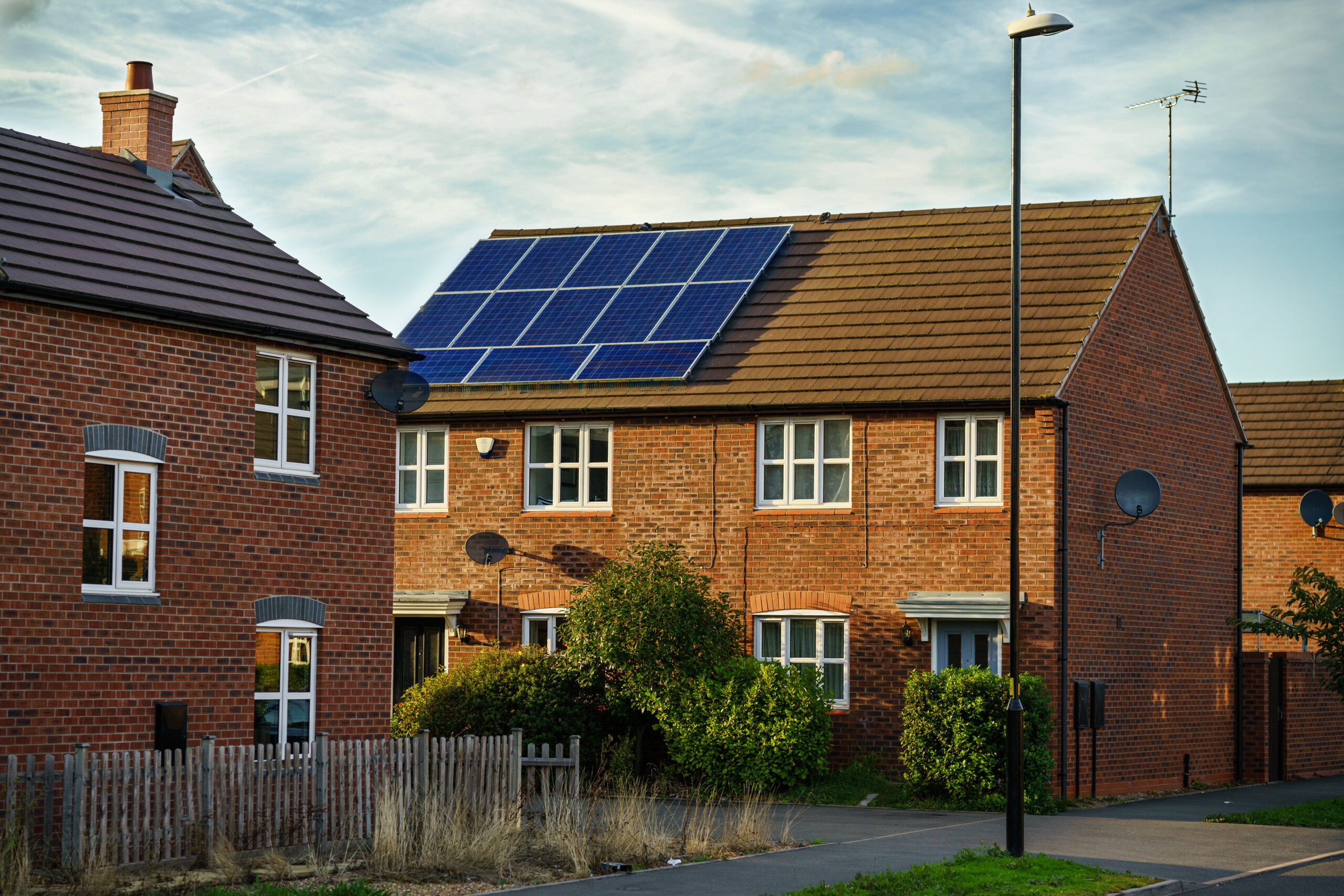 Solar PV panels on the roof of a residential home.